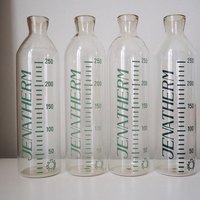 Set of four vintage glass bottles | Vintage Jenatherm laboratory bottles | Vintage apothecary bottles | Vintage glass vases