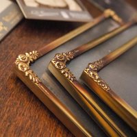 Set of three vintage brass photo frames | Brass photo frames 13x18 cm | Vintage brass picture frames | Vintage floral frames