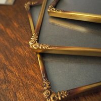 Set of three vintage brass photo frames | Brass photo frames 13x18 cm | Vintage brass picture frames | Vintage floral frames