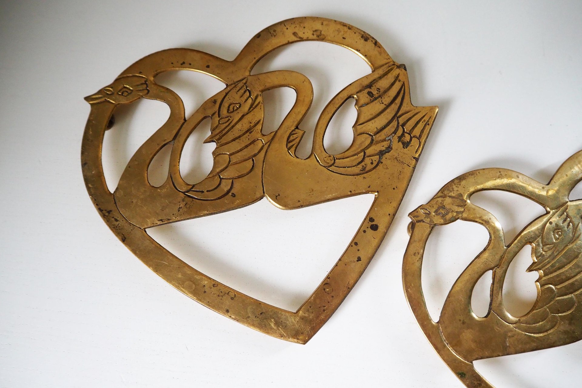 Vintage brass trivets | Set of two matching swan trivets | Heart shaped brass trivets | Brass trivets | Vintage kitchenware | Swan trivets