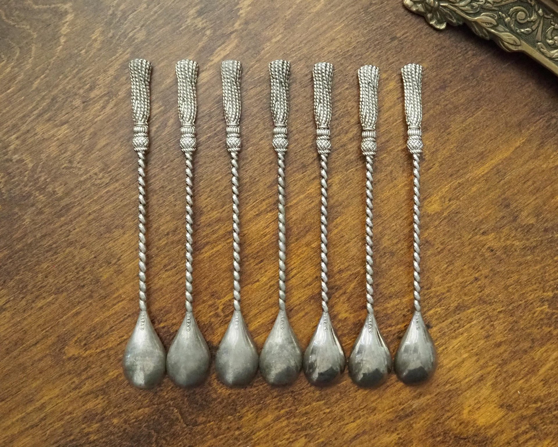 Set of seven vintage spoons | Silea tassel twisted handle spoons | Long vintage spoons | Silea spoons | Vintage dessert spoons