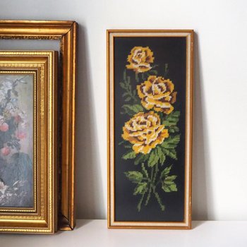 vintage needlepoint wall art with yellow roses